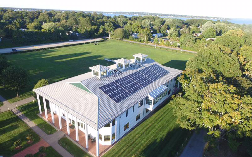 Aerial shot of Rocky Hill School in Rhode Island showing solar panels on the roof of the building.